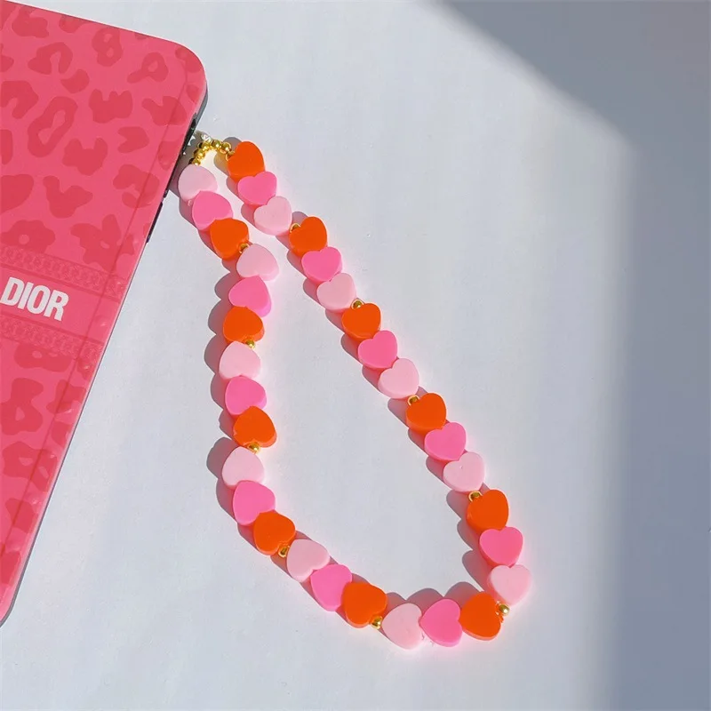 Attractive And Lovely Girly Pink Gradient Soft Ceramic Mobile Phone Chain Heart-Shaped Telephone Anti-Lost Lanyard Women Jewelry
Attractive And Lovely Girly Pink Gradient Soft Ceramic Mobile Phone Chain Heart-Shaped Telephone Anti-Lost Lanyard Women Jewelry