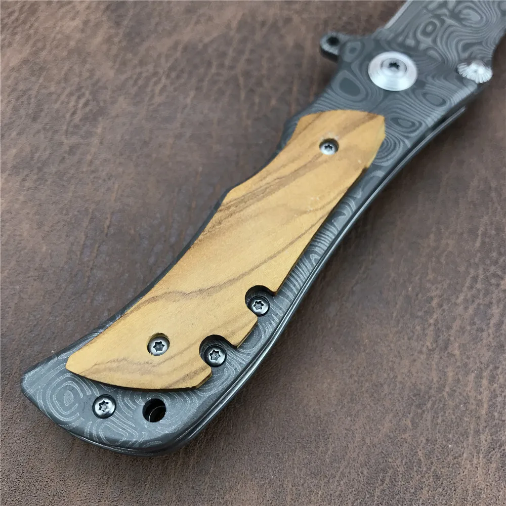 New 339 Pocket Hunting Folding Knife Damascus Pattern Wood Handle Survival Combat Tactical Knife Titanium Camping EDC Tools
New 339 Pocket Hunting Folding Knife Damascus Pattern Wood Handle Survival Combat Tactical Knife Titanium Camping EDC Tools