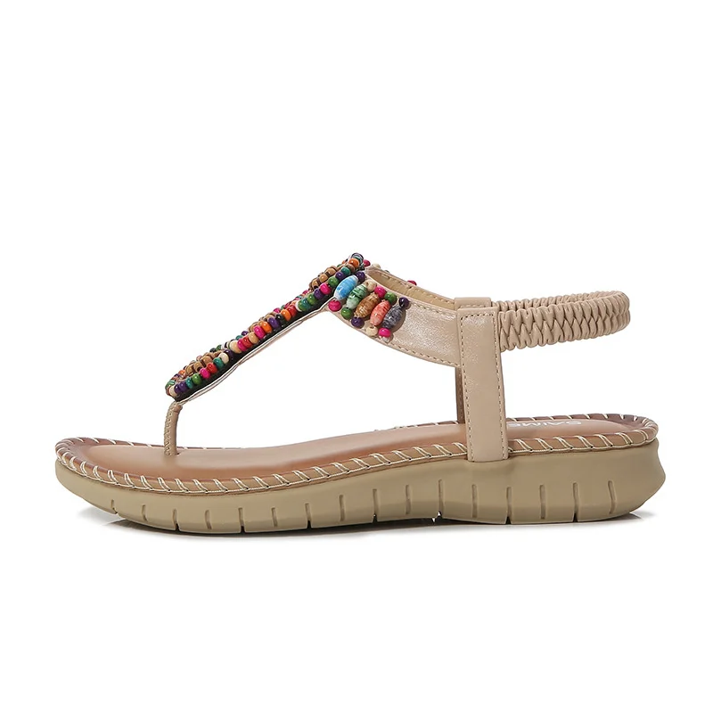 Flat bottom women's sandals in summer 2021 new one line buckle with beads and dew style large size shoes beach shoes
Flat bottom women's sandals in summer 2021 new one line buckle with beads and dew style large size shoes beach shoes