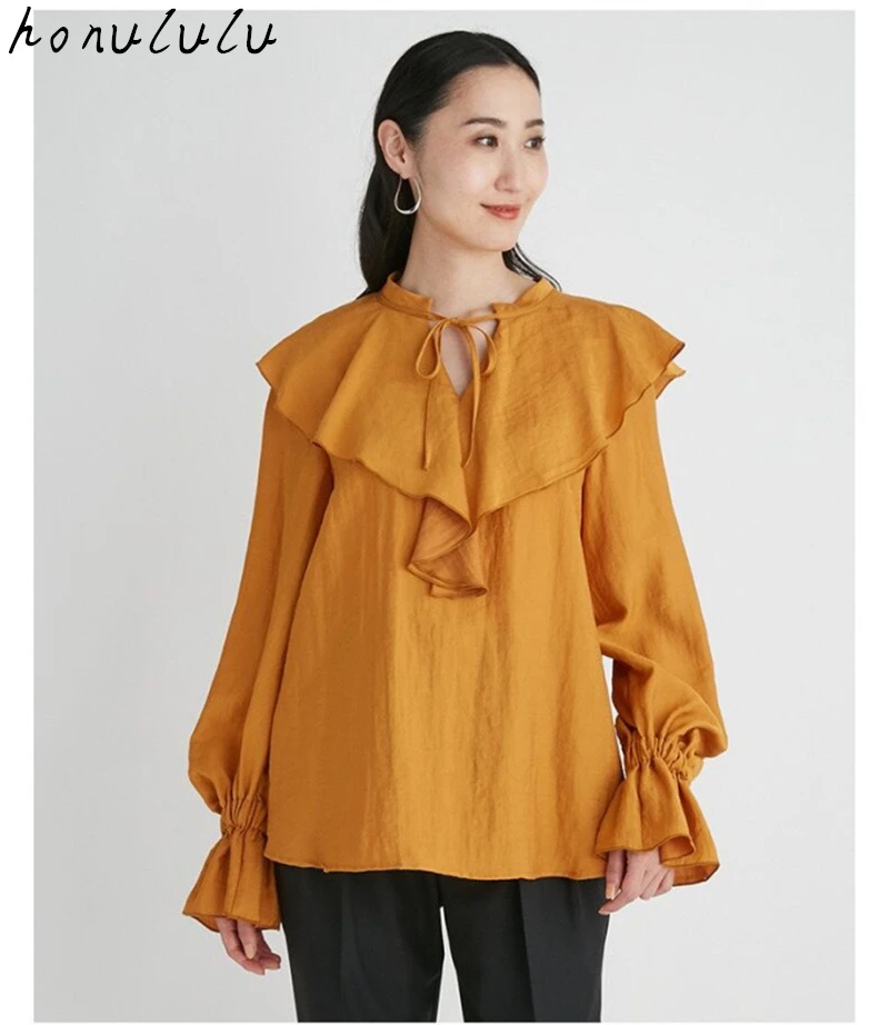 2021 autumn and winter new style Japanese solid color ruffled lapel long-sleeved cotton and linen shirt women
2021 autumn and winter new style Japanese solid color ruffled lapel long-sleeved cotton and linen shirt women