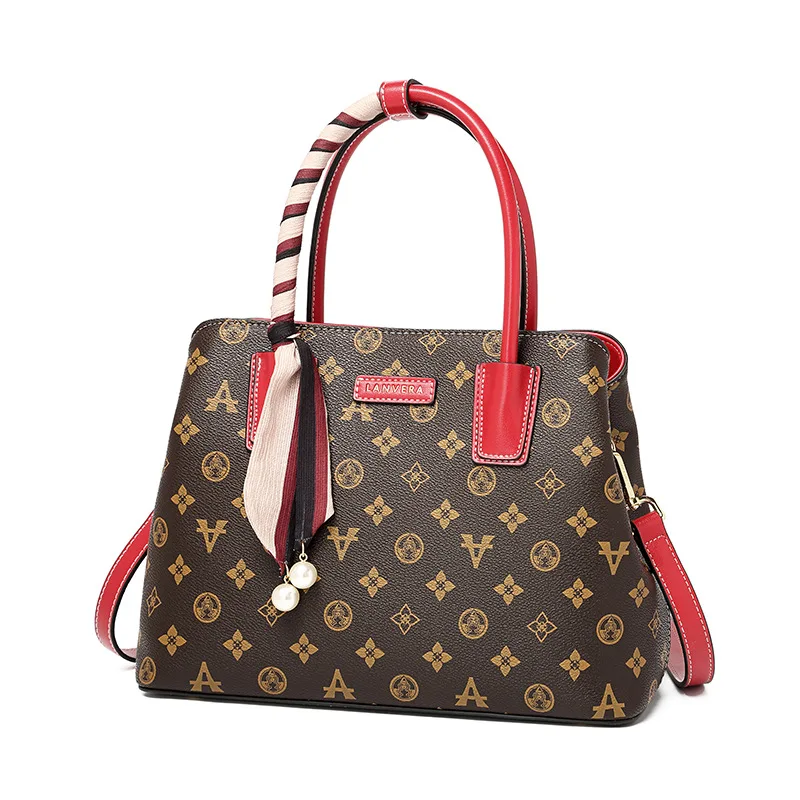Fashion handbags 2021 new European and American middle-aged trend portable printing messenger shoulder bag
Fashion handbags 2021 new European and American middle-aged trend portable printing messenger shoulder bag