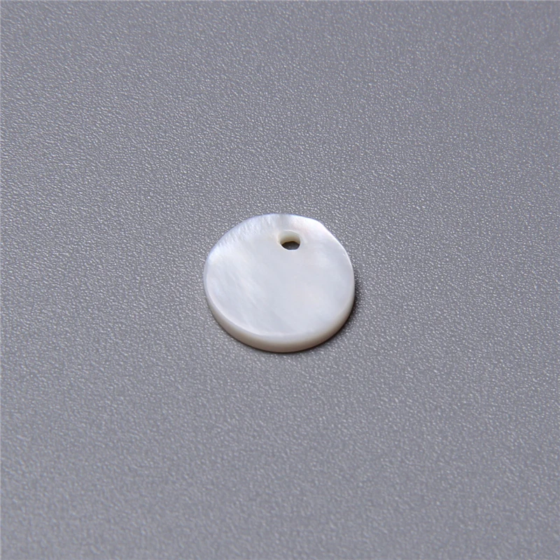 50pcs/set 10MM Natural Loose Round White Mother Of Pearl Shell Pendant Charm Chips for Jewelry Making Earring NecklaceBracelets 
50pcs/set 10MM Natural Loose Round White Mother Of Pearl Shell Pendant Charm Chips for Jewelry Making Earring NecklaceBracelets