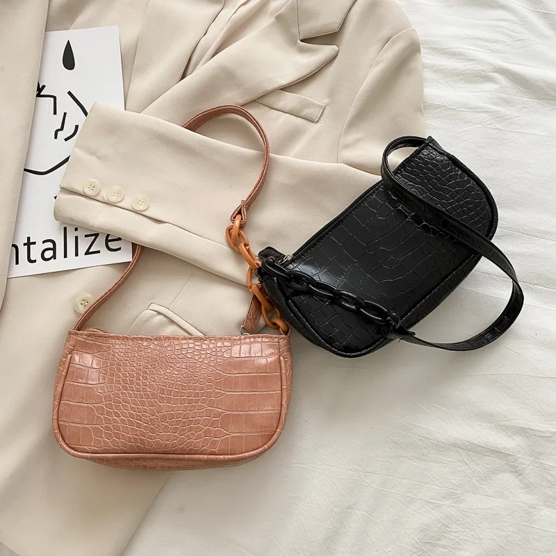 The new net red fashion INS trend crocodile print hand-held one-shoulder stick under the bag 
The new net red fashion INS trend crocodile print hand-held one-shoulder stick under the bag