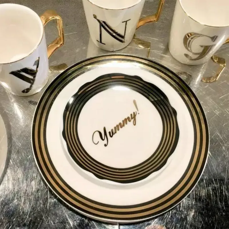 Bone china Personalized English lettering gold tea cup set home office beverage utensils lovers Coffee Cup Super gift forfriends
Bone china Personalized English lettering gold tea cup set home office beverage utensils lovers Coffee Cup Super gift forfriends