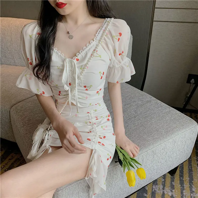 Summer Two Piece Set Women Print Sweet Drawstring V-neck Cherry Printed Top + High Waist Lace-up Sexy Skirt Kawaii Set Women
Summer Two Piece Set Women Print Sweet Drawstring V-neck Cherry Printed Top + High Waist Lace-up Sexy Skirt Kawaii Set Women