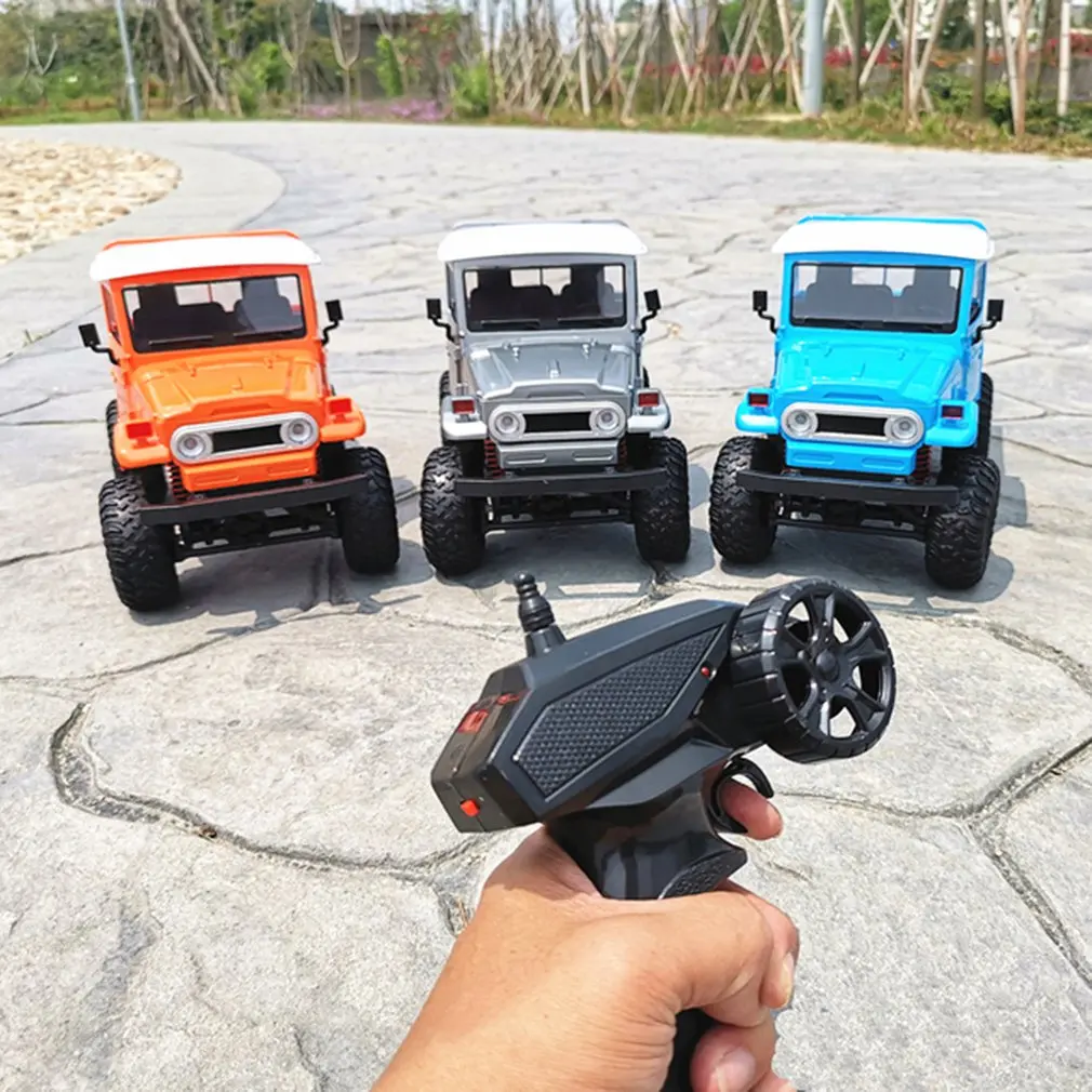 1:12 2.4G 4WD RC Car Off-road Vehicle Simulated Four Wheel Drive Climbing Car Remote Control Model Toy Car Kit 
1:12 2.4G 4WD RC Car Off-road Vehicle Simulated Four Wheel Drive Climbing Car Remote Control Model Toy Car Kit
