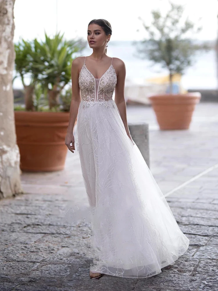 Luxury A-line Wedding Dresses V Neck Beaded Glamorous Tulle Gowns Sleeveless Sexy High Split Robe De Mariée Tailor-Made
Luxury A-line Wedding Dresses V Neck Beaded Glamorous Tulle Gowns Sleeveless Sexy High Split Robe De Mariée Tailor-Made