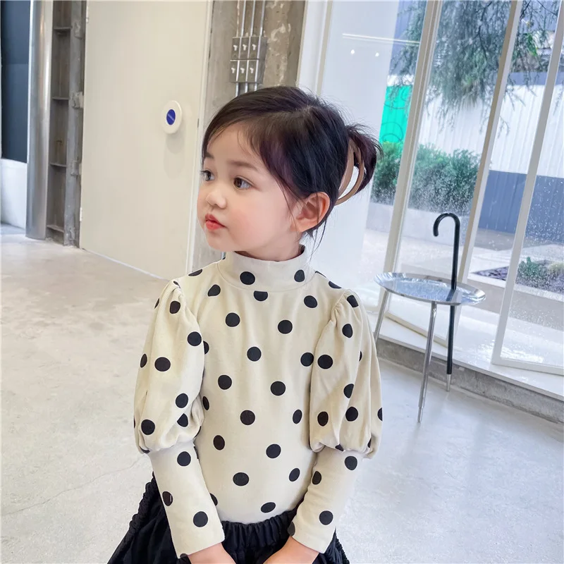 2021 autumn girl sweet princess bubble sleeve full wave dot bottomed shirt top baby girl half high neck T-shirt
2021 autumn girl sweet princess bubble sleeve full wave dot bottomed shirt top baby girl half high neck T-shirt