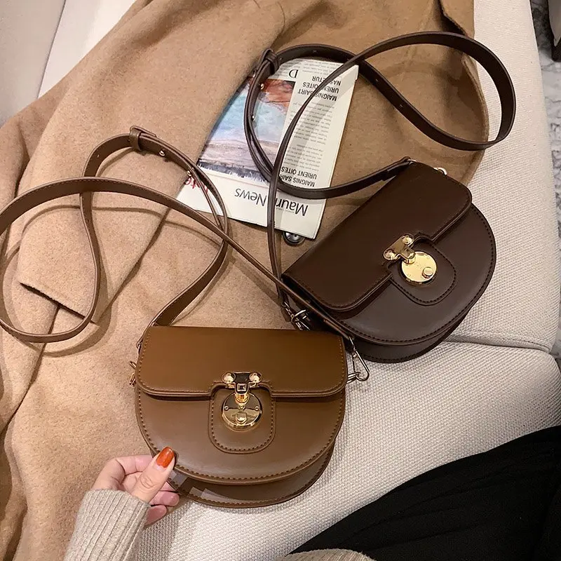 Vintage Pure Color Mini Saddle Bag 2020 Winter High Quality Leather Women's Designer Handbag Lock Shoulder Crossbody Purses
Vintage Pure Color Mini Saddle Bag 2020 Winter High Quality Leather Women's Designer Handbag Lock Shoulder Crossbody Purses
