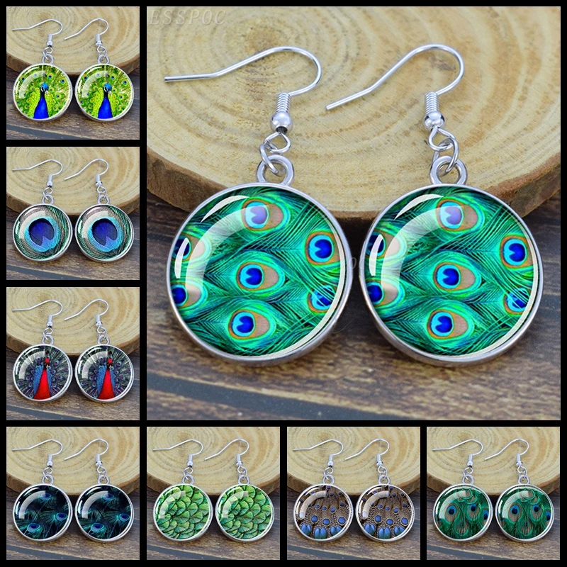 Peacock Feather Pattern Dangle Earring Peacock Pendant Glass Cabochon Drop Earrings for Women Ear Hook Bohemian Jewelry
Peacock Feather Pattern Dangle Earring Peacock Pendant Glass Cabochon Drop Earrings for Women Ear Hook Bohemian Jewelry