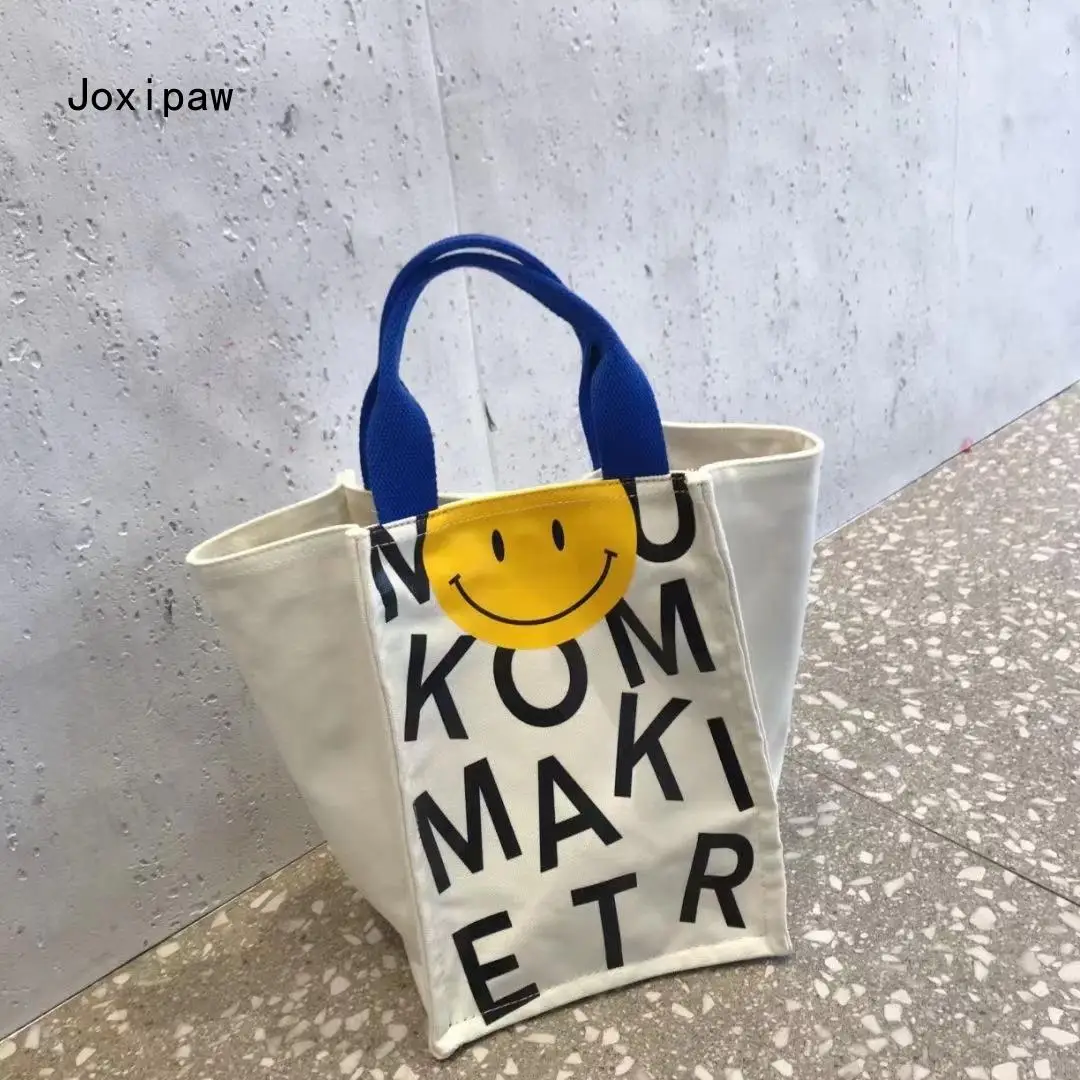 Fashion 2021 Spring/summer Ins Net Red Smiley Letter Print Canvas Bag Korean Hand Wing Bag Female
Fashion 2021 Spring/summer Ins Net Red Smiley Letter Print Canvas Bag Korean Hand Wing Bag Female