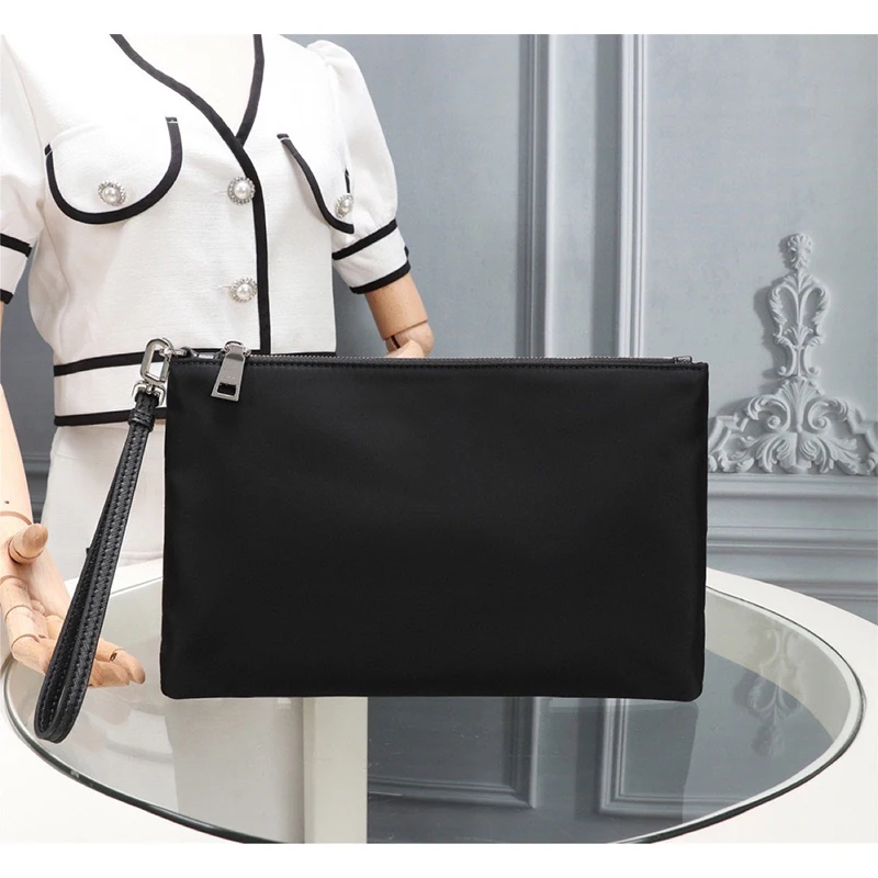 New men's Nylon waterproof cloth handbag business parachute wallet canvas envelope men's bag
New men's Nylon waterproof cloth handbag business parachute wallet canvas envelope men's bag