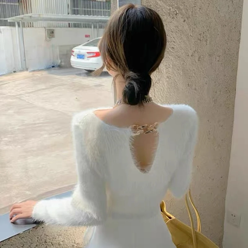 Black long-sleeved short sweater hollow chain plush fleece top to keep warm autumn and winter T-shirt
Black long-sleeved short sweater hollow chain plush fleece top to keep warm autumn and winter T-shirt