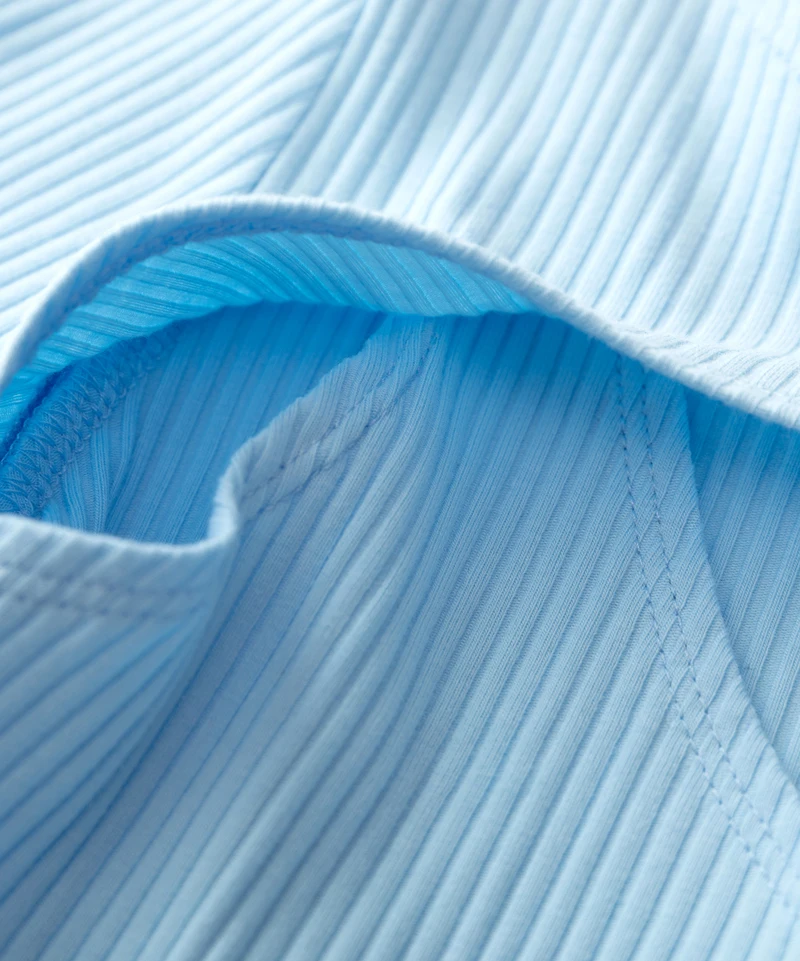 Women Crew Neck Long Sleeve Rib Top With Cut Out Detail
Women Crew Neck Long Sleeve Rib Top With Cut Out Detail