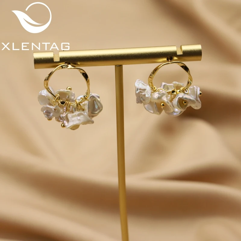 Женские серьги с пресноводным жемчугом Xlentag, серьги-подвески из чистой латуни с покрытием из 18-каратного золота, роскошные ювелирные украше... 
Женские серьги с пресноводным жемчугом Xlentag, серьги-подвески из чистой латуни с покрытием из 18-каратного золота, роскошные ювелирные украше...