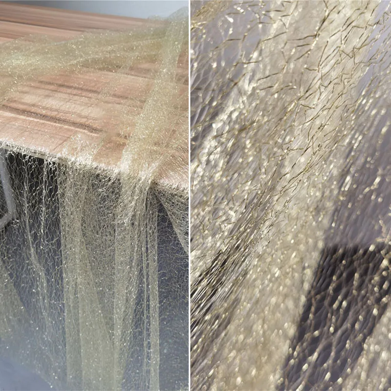 Soft White Yarn Gold Thread Designer Mesh Fabric IIrregular Hollow Net Texture Sewing DIY Dress Perspective Clothing Material
Soft White Yarn Gold Thread Designer Mesh Fabric IIrregular Hollow Net Texture Sewing DIY Dress Perspective Clothing Material