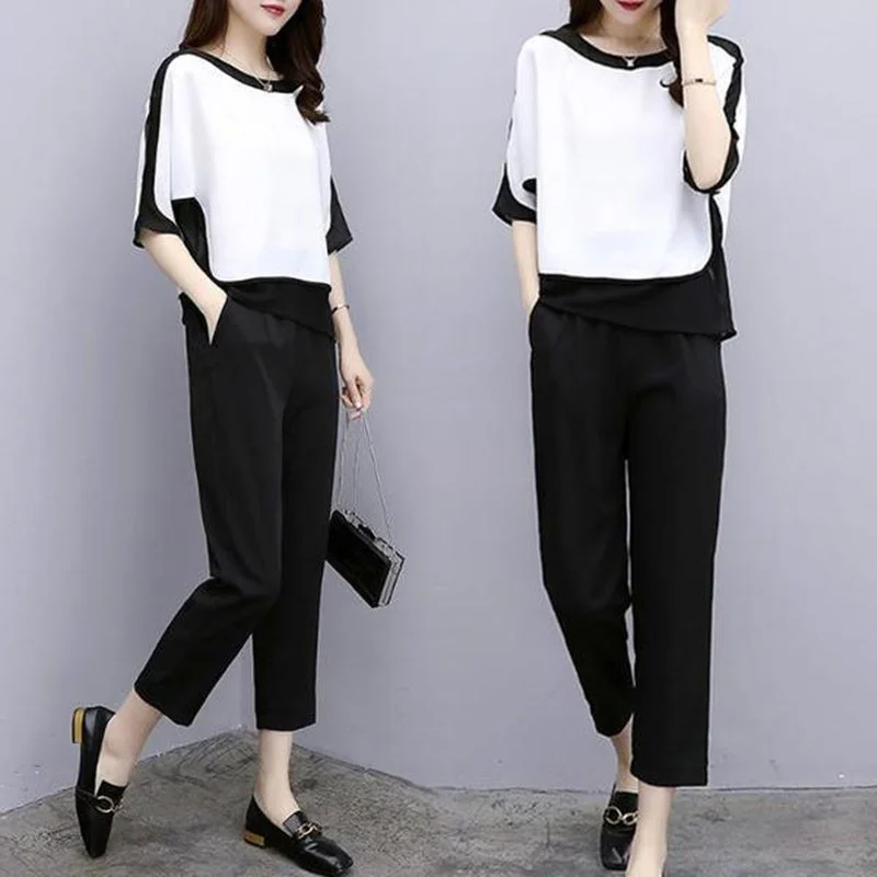2021 Two-piece Woman Suit Summer Loose Korean Fashion Casual New Stitching Short Sleeve T-shirts Long Pants Clothing Suit
2021 Two-piece Woman Suit Summer Loose Korean Fashion Casual New Stitching Short Sleeve T-shirts Long Pants Clothing Suit