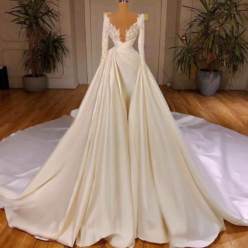 Overskirts Wedding Dresses Long Sleeves Scoop Sheer Neckline Lace And Satin Bridal Dress Arabic Pleats robe de soirée de mariage
Overskirts Wedding Dresses Long Sleeves Scoop Sheer Neckline Lace And Satin Bridal Dress Arabic Pleats robe de soirée de mariage