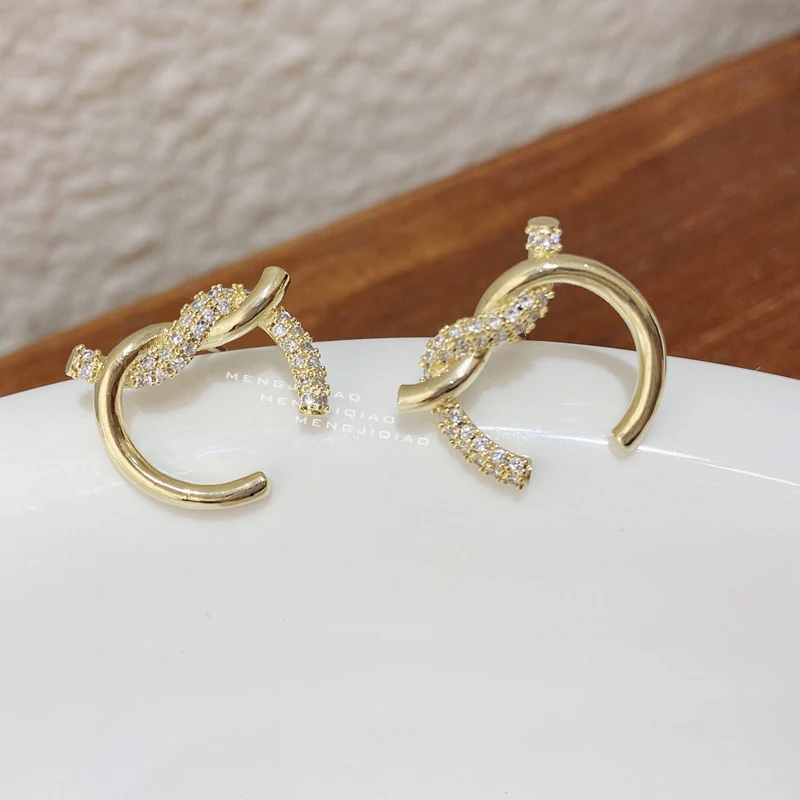 MENGJIQIAO Korean Cute Micro Paved Zircon Twist Knot Stud Earrings For Women Girls Fashion Metal Circle Pendientes Jewelry
MENGJIQIAO Korean Cute Micro Paved Zircon Twist Knot Stud Earrings For Women Girls Fashion Metal Circle Pendientes Jewelry
