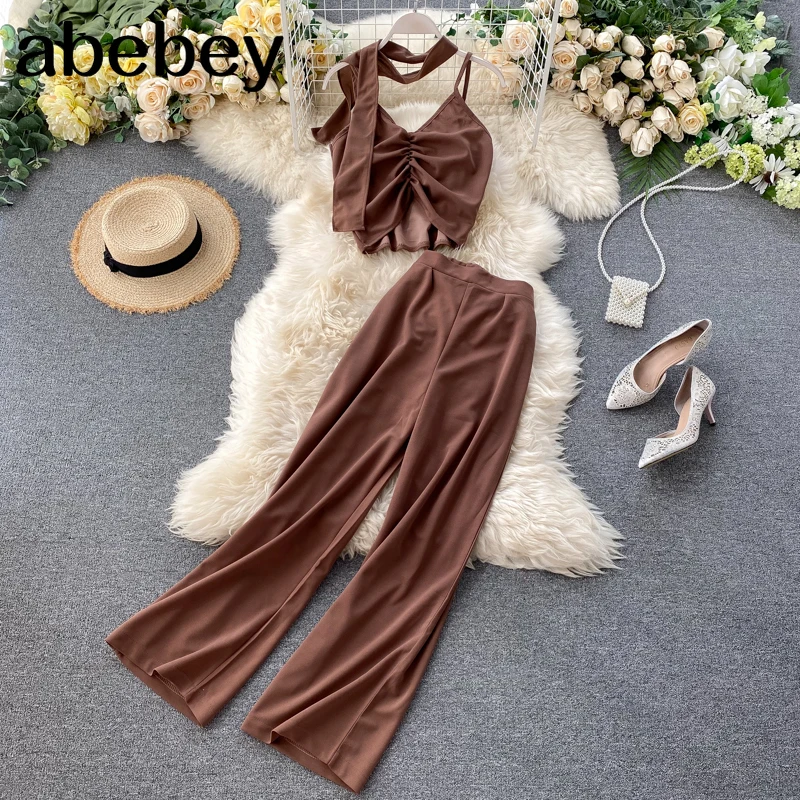 Women Suits 2021 Fashion New Female Folds Short Camisole + High-Waisted Wide Leg Pants Fashion Two-Piece Set
Women Suits 2021 Fashion New Female Folds Short Camisole + High-Waisted Wide Leg Pants Fashion Two-Piece Set