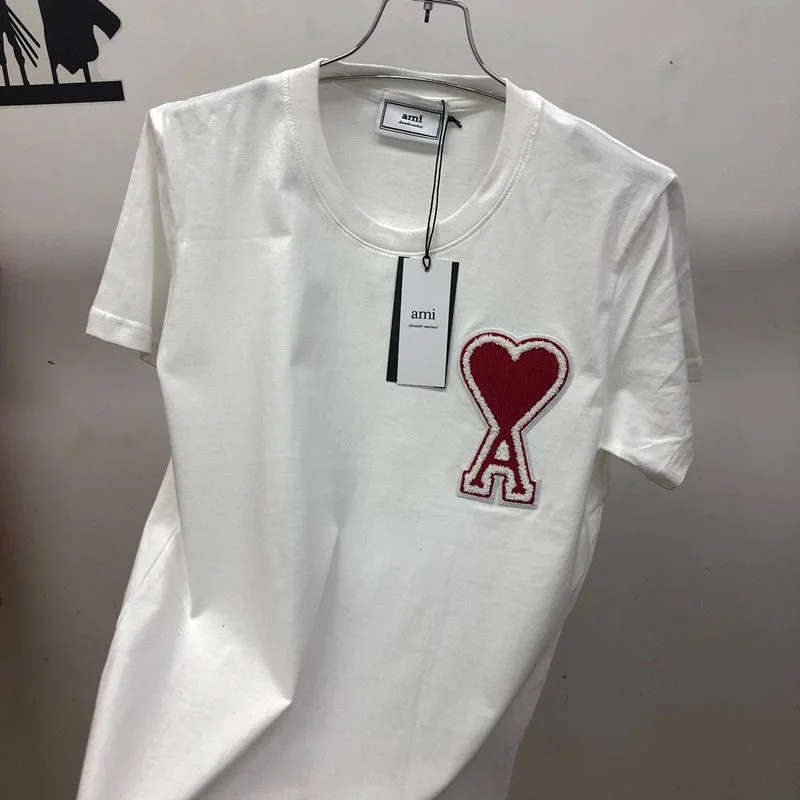 2021 AMi Classic Love Peach Heart Logo Ricamo Minimalista T-Shirt Manica Corta Da Uomo E Da Donna T-Shirt Oversize In Cotone
2021 AMi Classic Love Peach Heart Logo Ricamo Minimalista T-Shirt Manica Corta Da Uomo E Da Donna T-Shirt Oversize In Cotone