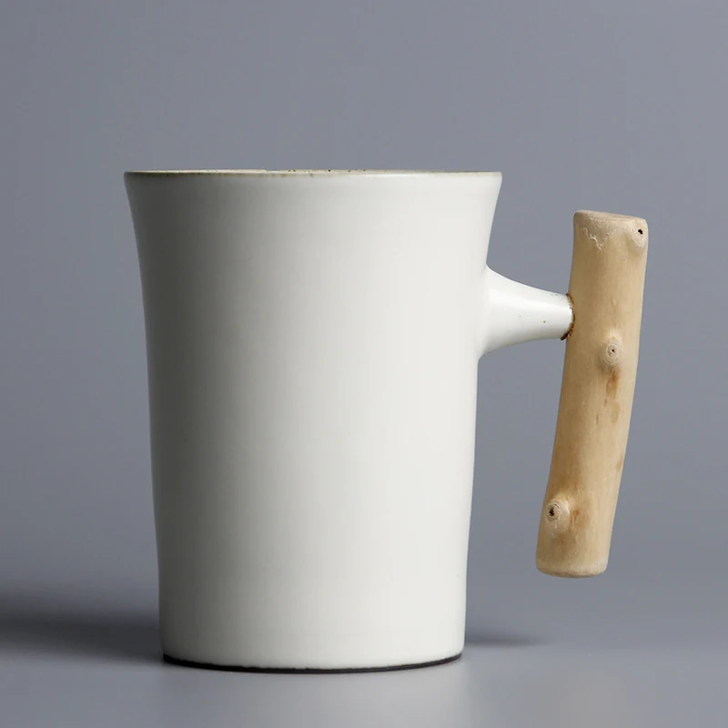 New 350-400ml Japanese retro style wooden handle milk coffee cup home office anti-rust ceramic mug for friends and family gifts
New 350-400ml Japanese retro style wooden handle milk coffee cup home office anti-rust ceramic mug for friends and family gifts