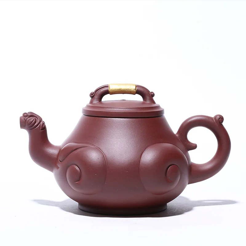 Yixing famous handmade purple clay teapot raw ore purple clay gold Ruyi dragon teapot kungfu tea set
Yixing famous handmade purple clay teapot raw ore purple clay gold Ruyi dragon teapot kungfu tea set