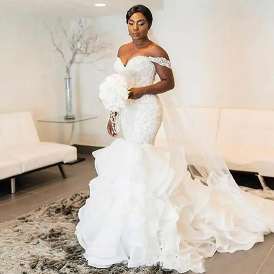African vestido de noiva Mermaid Wedding Dresses off the shoulder Vintage Cascading Ruffles Organza beaded Crystal Bridal Gowns
African vestido de noiva Mermaid Wedding Dresses off the shoulder Vintage Cascading Ruffles Organza beaded Crystal Bridal Gowns