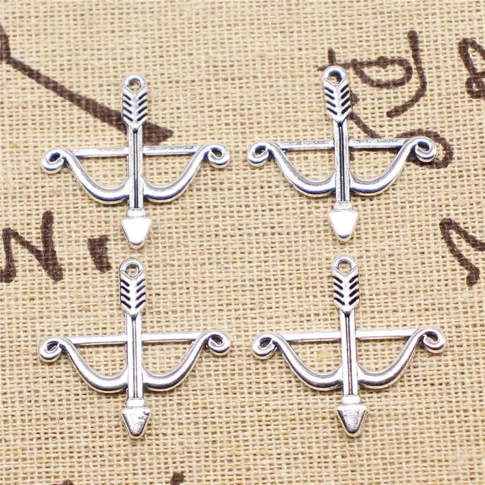 Charm For Making Jewelry Pendants Antique Silver Color Bow And Arrow 26x25mm 10pcs
Charm For Making Jewelry Pendants Antique Silver Color Bow And Arrow 26x25mm 10pcs