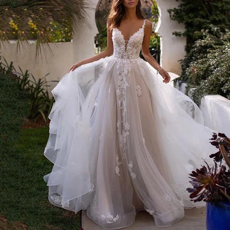 2021 Kayars Champagne Spaghetti Strap V Neck A Line Backless Wedding Dress with Train Layla 3D Flowers Floor Length Wedding Gown
2021 Kayars Champagne Spaghetti Strap V Neck A Line Backless Wedding Dress with Train Layla 3D Flowers Floor Length Wedding Gown