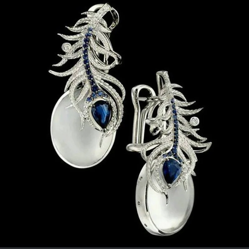 Women Boho Natural Peacock Feathers Pendant Earrings Jewelry Bohemian Cat Eye Metal Ellipse Circle Leaf Beads Earring Ear Clip
Women Boho Natural Peacock Feathers Pendant Earrings Jewelry Bohemian Cat Eye Metal Ellipse Circle Leaf Beads Earring Ear Clip
