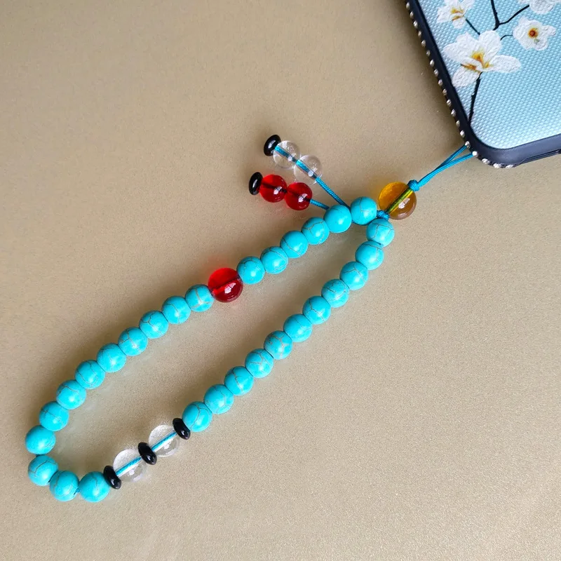 Original DIY blue turquoise mobile phone lanyard short non-slip crystal beads cute female white turquoise wrist lanyard pendant
Original DIY blue turquoise mobile phone lanyard short non-slip crystal beads cute female white turquoise wrist lanyard pendant