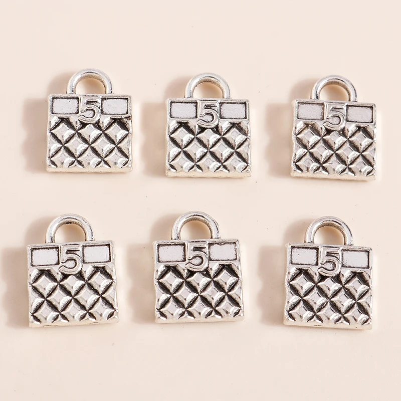 15pcs 10*14mm Cute Alloy Cosmetic Bag for Jewelry Making DIY Handmade Necklaces Earrings Making Craft Supplies Accessories
15pcs 10*14mm Cute Alloy Cosmetic Bag for Jewelry Making DIY Handmade Necklaces Earrings Making Craft Supplies Accessories