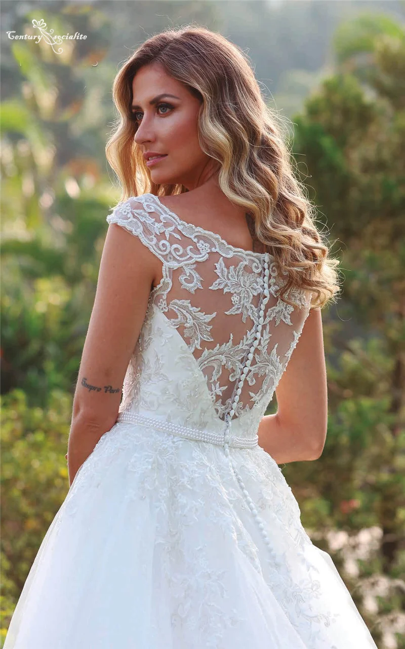 Princess Wedding Dresses 2021 Pearls Lace Appliques V-Neck Ball Gown African Bridal Gowns Robe Mariage Vestido De Noiva
Princess Wedding Dresses 2021 Pearls Lace Appliques V-Neck Ball Gown African Bridal Gowns Robe Mariage Vestido De Noiva
