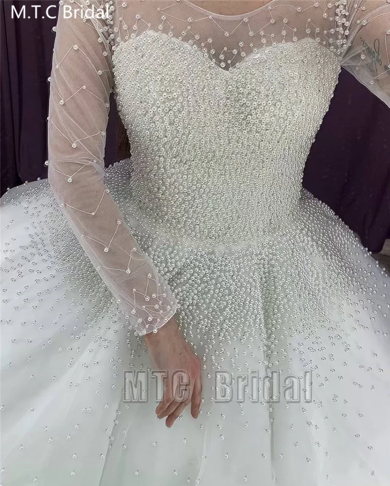 2020 Luxury Pearls Princess Dubai Wedding Dresses Long Sleeves Puffy Tulle Plus Size Bridal Wedding Party Gowns Robe De Mariee
2020 Luxury Pearls Princess Dubai Wedding Dresses Long Sleeves Puffy Tulle Plus Size Bridal Wedding Party Gowns Robe De Mariee
