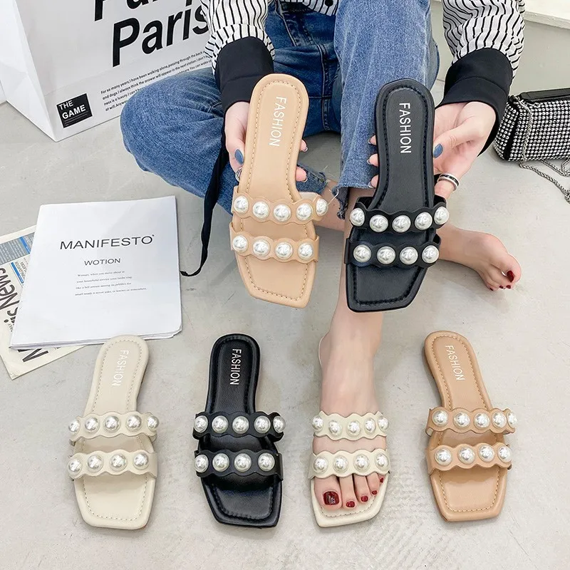 2021 Summer New Women Slippers Sexy Large Pearl Flat Sandals Female Hollow Out Solid Color Fashion Ladies Flip Flop Casual Shoes
2021 Summer New Women Slippers Sexy Large Pearl Flat Sandals Female Hollow Out Solid Color Fashion Ladies Flip Flop Casual Shoes