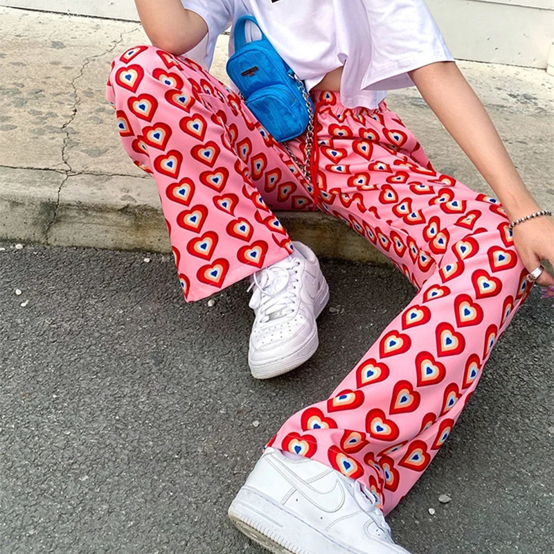 WEPBEL Women Loose Traffic Pants Ladies Pink Heart-shaped Print High Waist Drawstring Pants Vintage Harajuku Streetwear Trouser
WEPBEL Women Loose Traffic Pants Ladies Pink Heart-shaped Print High Waist Drawstring Pants Vintage Harajuku Streetwear Trouser