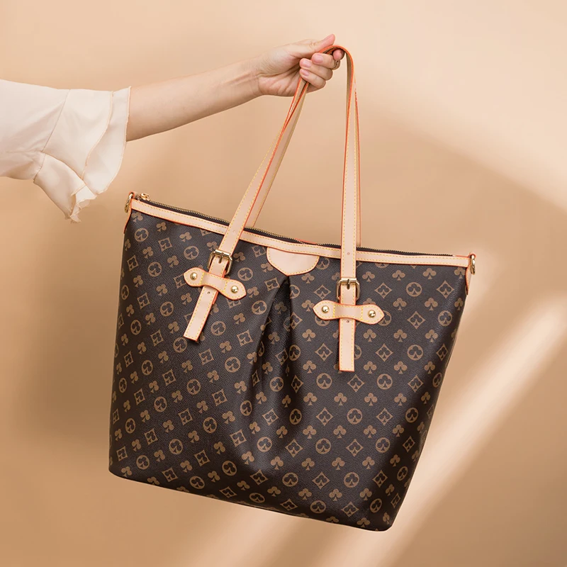 Tote bag commuter big bag female 2021 new big-name printing single-handle shoulder bag large-capacity shopping shopping bag
Tote bag commuter big bag female 2021 new big-name printing single-handle shoulder bag large-capacity shopping shopping bag
