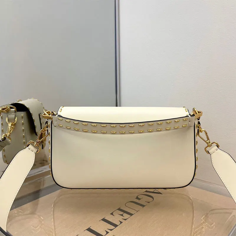 Natural cowhide nailed baguette bag ladies new crossbody shoulder bag fashion underarm rectangular handbag saddle bag
Natural cowhide nailed baguette bag ladies new crossbody shoulder bag fashion underarm rectangular handbag saddle bag
