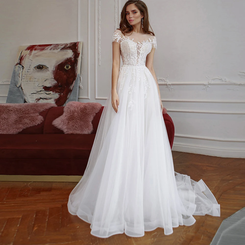 Elegant Wedding Dresses Tulle Pleat Appliques Bateau Short Sleeve Zipper A-Line Bridal Gowns Novia Do 2021 New Party
Elegant Wedding Dresses Tulle Pleat Appliques Bateau Short Sleeve Zipper A-Line Bridal Gowns Novia Do 2021 New Party