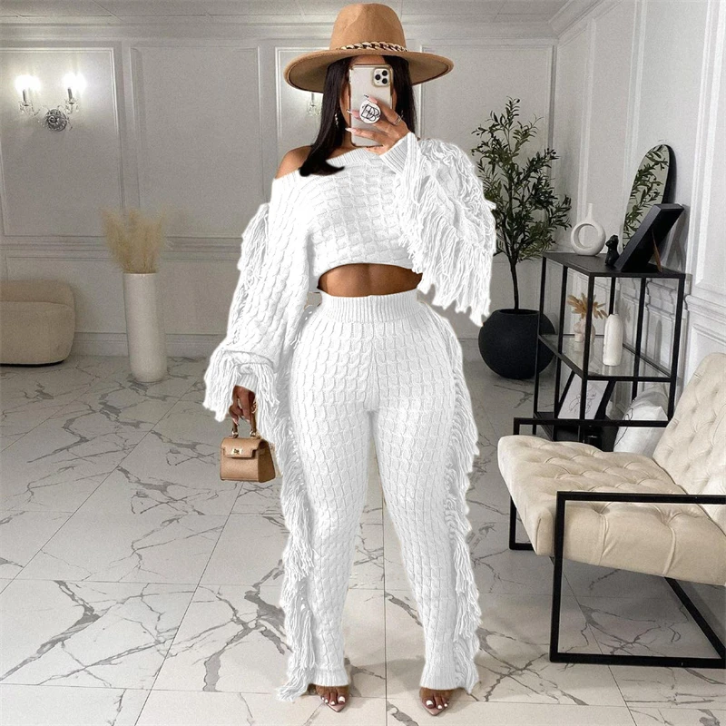 2021 autumn and winter new European and American women's casual solid color knitted long-sleeved short top tassel suit
2021 autumn and winter new European and American women's casual solid color knitted long-sleeved short top tassel suit