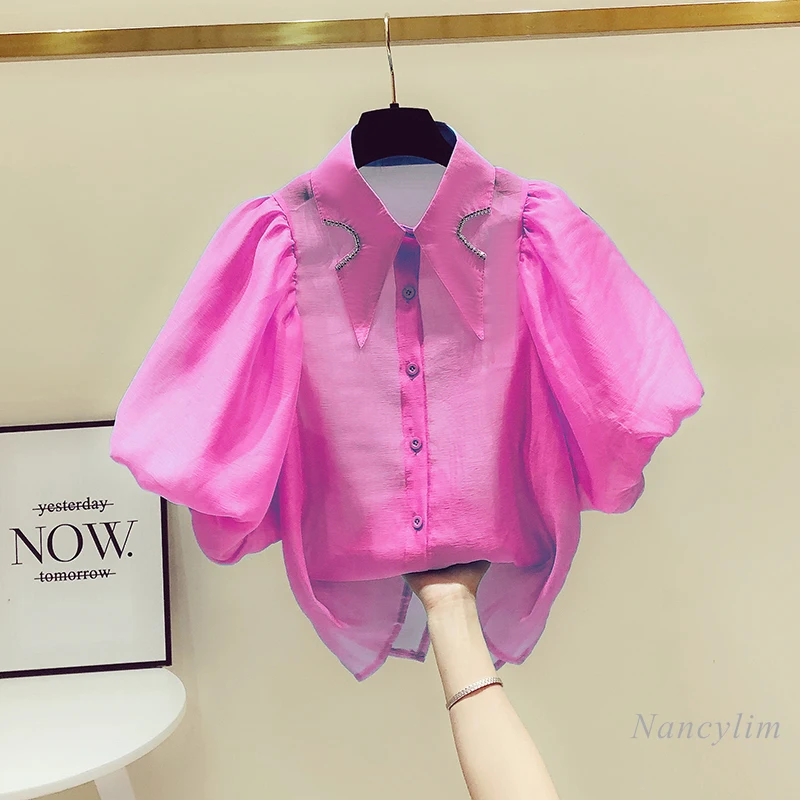 Diamond-Embedded Lapel Puff Sleeve White Blouses Femme Summer Vintage Blue Shirt Elegant Lady Tops Summer Blusas Mujer 2021
Diamond-Embedded Lapel Puff Sleeve White Blouses Femme Summer Vintage Blue Shirt Elegant Lady Tops Summer Blusas Mujer 2021