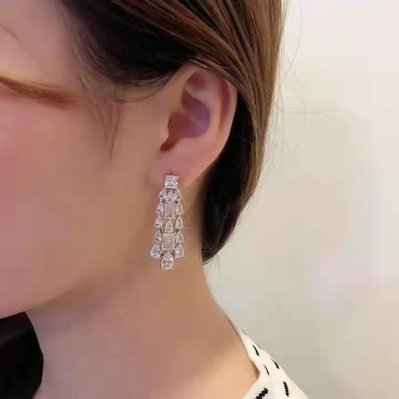 Women's gorgeous fashion stream zircon earrings original brand high quality jewelry logo gift
Women's gorgeous fashion stream zircon earrings original brand high quality jewelry logo gift