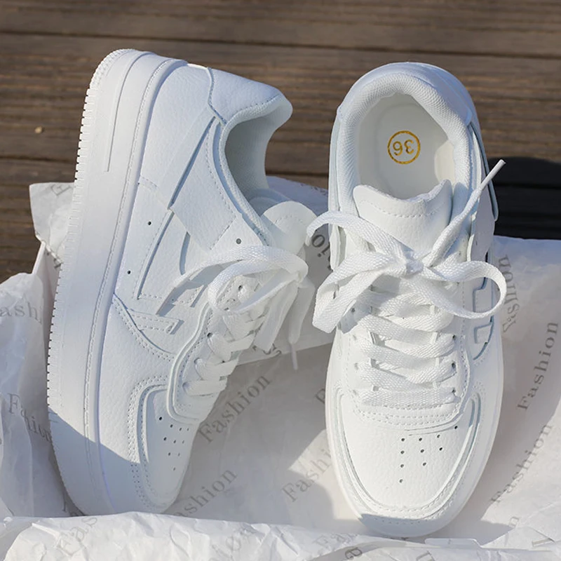 2021 New Women Running PU Leather White Casual Vulcanized Sneakers Breathable Sport Walking Spring Autumn Platform Flats Shoes 
2021 New Women Running PU Leather White Casual Vulcanized Sneakers Breathable Sport Walking Spring Autumn Platform Flats Shoes
