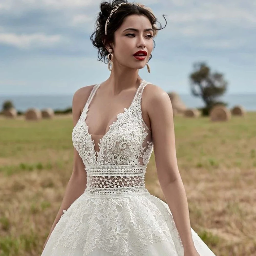 Ivory Beaded Lace Wedding Dresses Deep V Neck Beach Bridal Gowns Sweep Train A Line Bohemian Vestido De Novia 
Ivory Beaded Lace Wedding Dresses Deep V Neck Beach Bridal Gowns Sweep Train A Line Bohemian Vestido De Novia