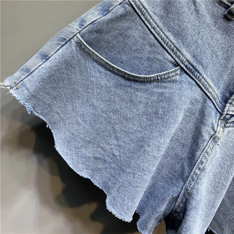2021 Summer Korean Style Women Ruffled Denim Shorts Loose Slimming Wide Leg Hot Jeans Pants Fashion Solid Color Flared Pantskirt
2021 Summer Korean Style Women Ruffled Denim Shorts Loose Slimming Wide Leg Hot Jeans Pants Fashion Solid Color Flared Pantskirt