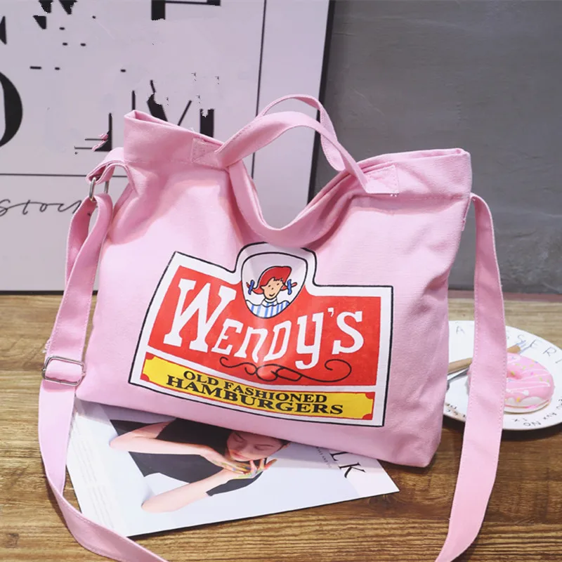 New Cartoon Letter Printed Women's Shoulder Bag Korean Printed Canvas One-shoulder Diagonal Women's Bag Casual Student Clutch
New Cartoon Letter Printed Women's Shoulder Bag Korean Printed Canvas One-shoulder Diagonal Women's Bag Casual Student Clutch