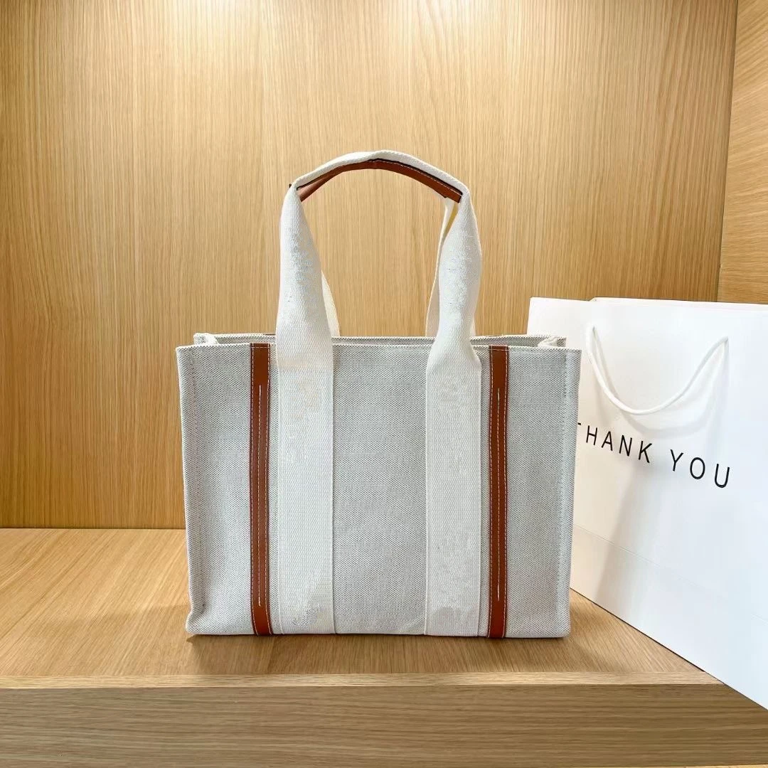 women bags luxury designer handbag logo canvas bag large capacity summer new tote bag
women bags luxury designer handbag logo canvas bag large capacity summer new tote bag