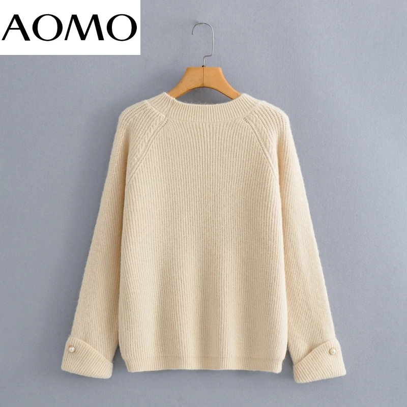 AOMO Women Pearl Buttons Decorate Beige Knitted Sweater Jumper O Neck Female Elegant Oversize Pullovers Chic Tops BC104A
AOMO Women Pearl Buttons Decorate Beige Knitted Sweater Jumper O Neck Female Elegant Oversize Pullovers Chic Tops BC104A
