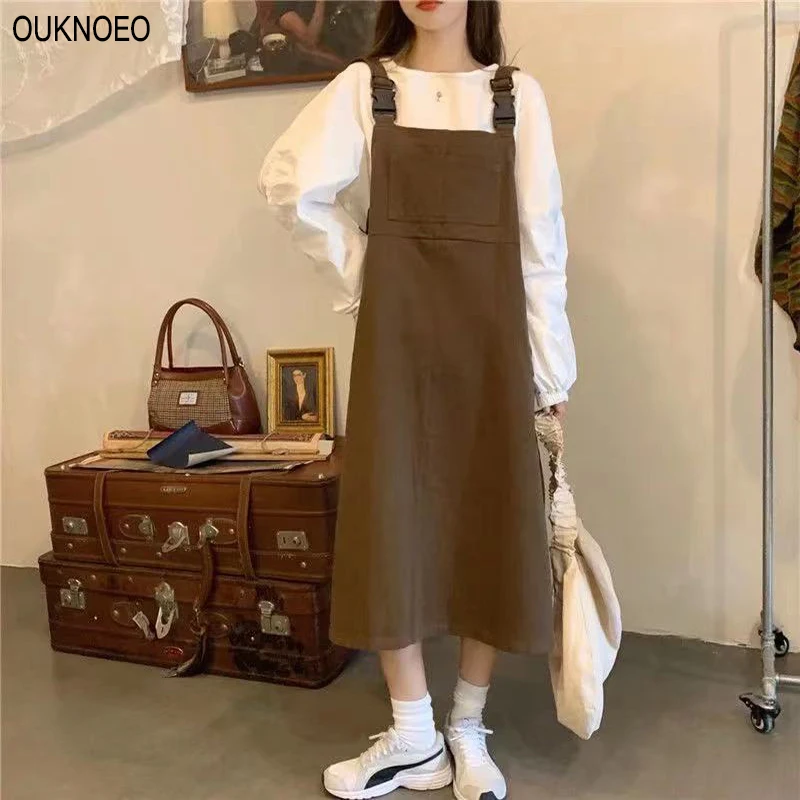 2021 spring women Korean dress academy style black coffee retro round neck loose top suit commuter big pocket design strap skirt
2021 spring women Korean dress academy style black coffee retro round neck loose top suit commuter big pocket design strap skirt